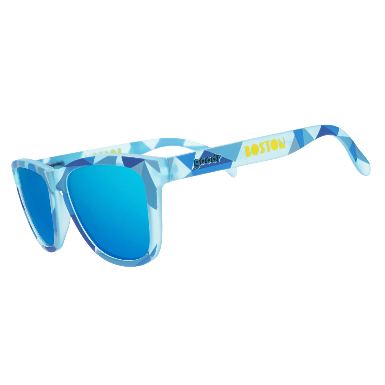 Blue sunglasses with a patterned frame on a white background. Available at Be Charmed
