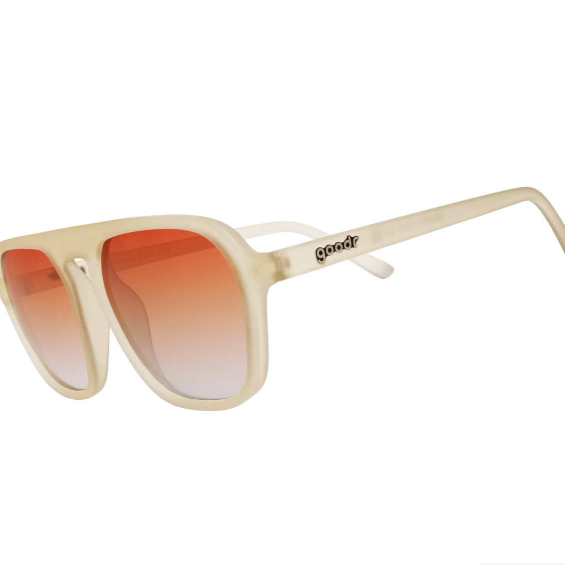Grey sunglasses with red gradient lenses on a white background. Available at Be Charmed