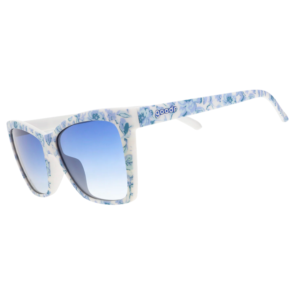 Sunglasses with floral patterned arms on a white background. Available at Be Charmed