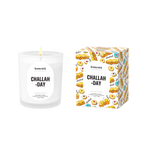 Homesick 'Challah Day' candle and packaging on a white background. Available at Be Charmed. 