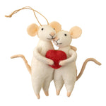 Two stuffed mice holding a red heart on a beige background. Available at Be Charmed
