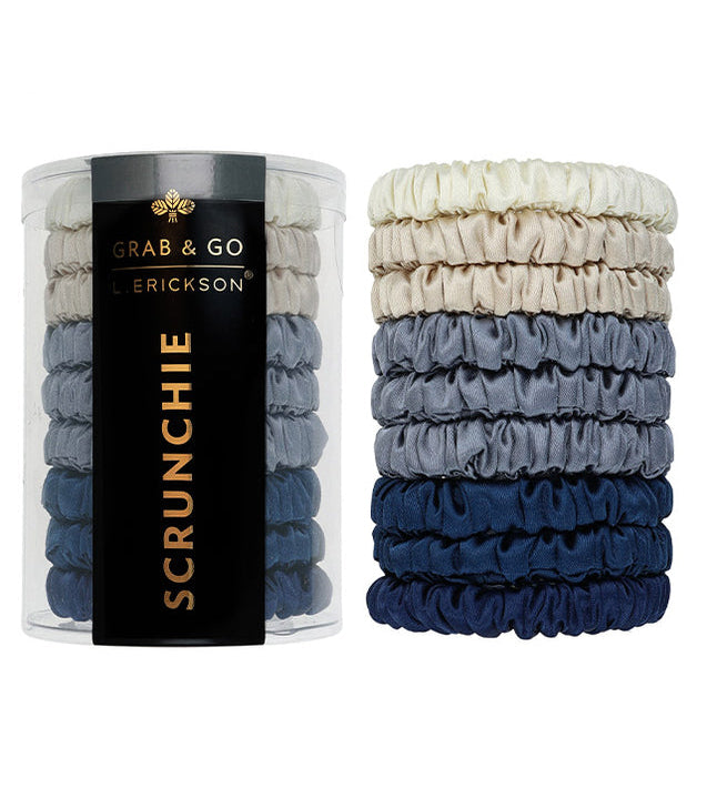 Set of scrunchies in blue and gray with a container labeled 'Grab & Go Erickson' on a white background. Available at Be Charmed