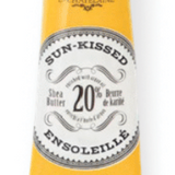 Hand cream tube labeled 'Sun-Kissed' by L'Chanteclaire on a white background. Available at Be Charmed