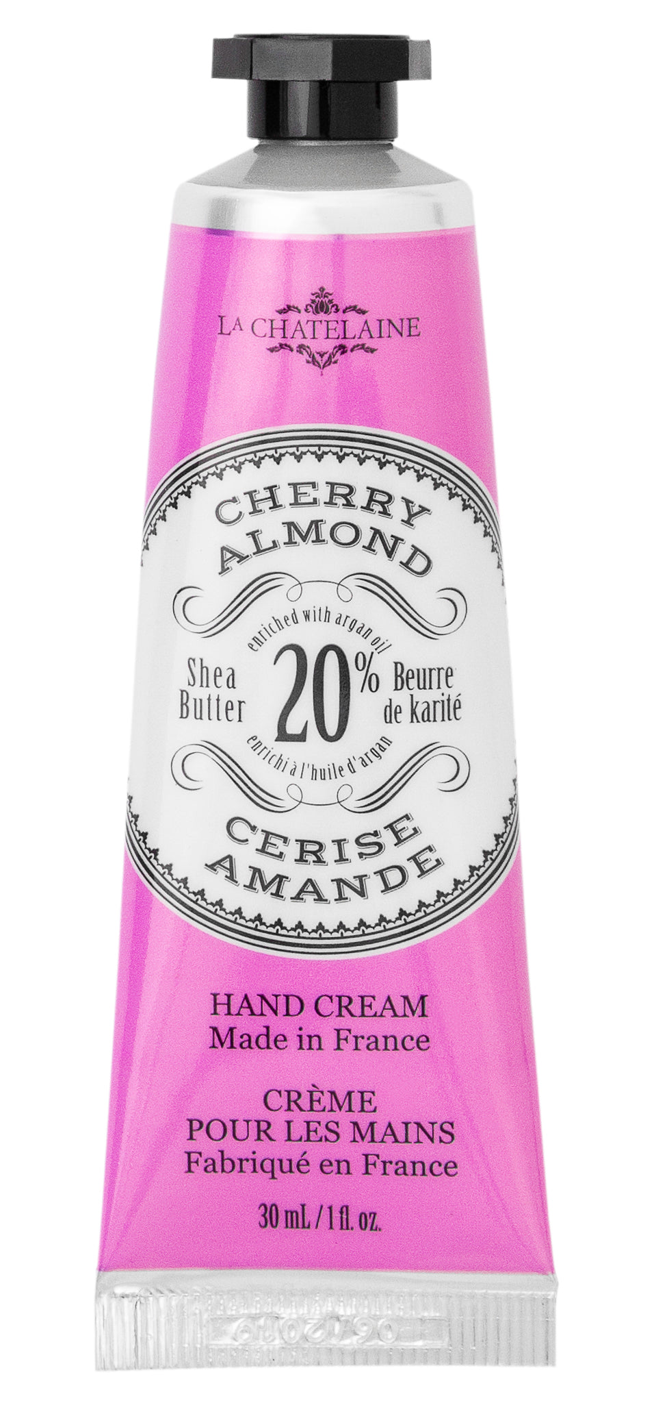 Purple hand cream tube labeled 'Cherry Almond' with branding on a white background. Available at Be Charmed