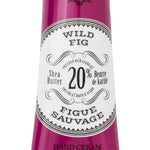 Hand cream tube labeled 'Wild Fig' with branding on a white background. Available at Be Charmed
