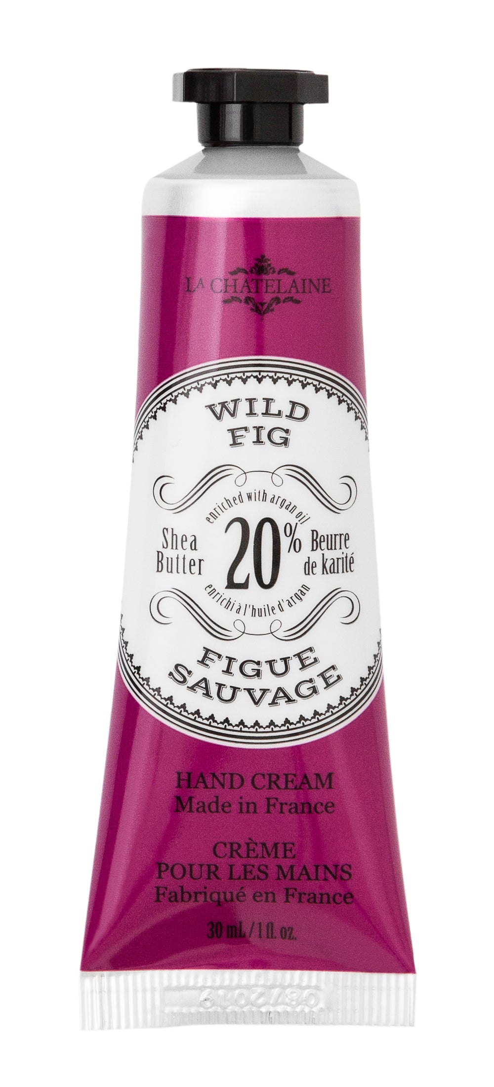 Hand cream tube labeled 'Wild Fig' with branding on a white background. Available at Be Charmed