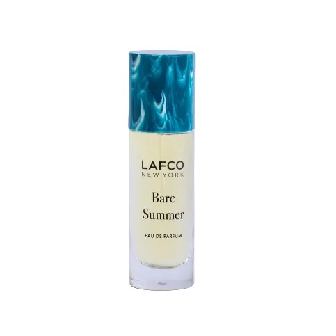 A bottle of LAFCO New York Bare Summer Eau de Parfum with a blue marbled cap and a cream-colored body, set against a plain white background. Available at Be Charmed