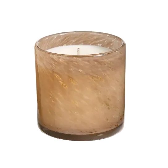 A single-wick candle in a cylindrical amber glass jar with subtle gold flecks and a white wax fill, photographed on a clean white background. Available at BE Charmed