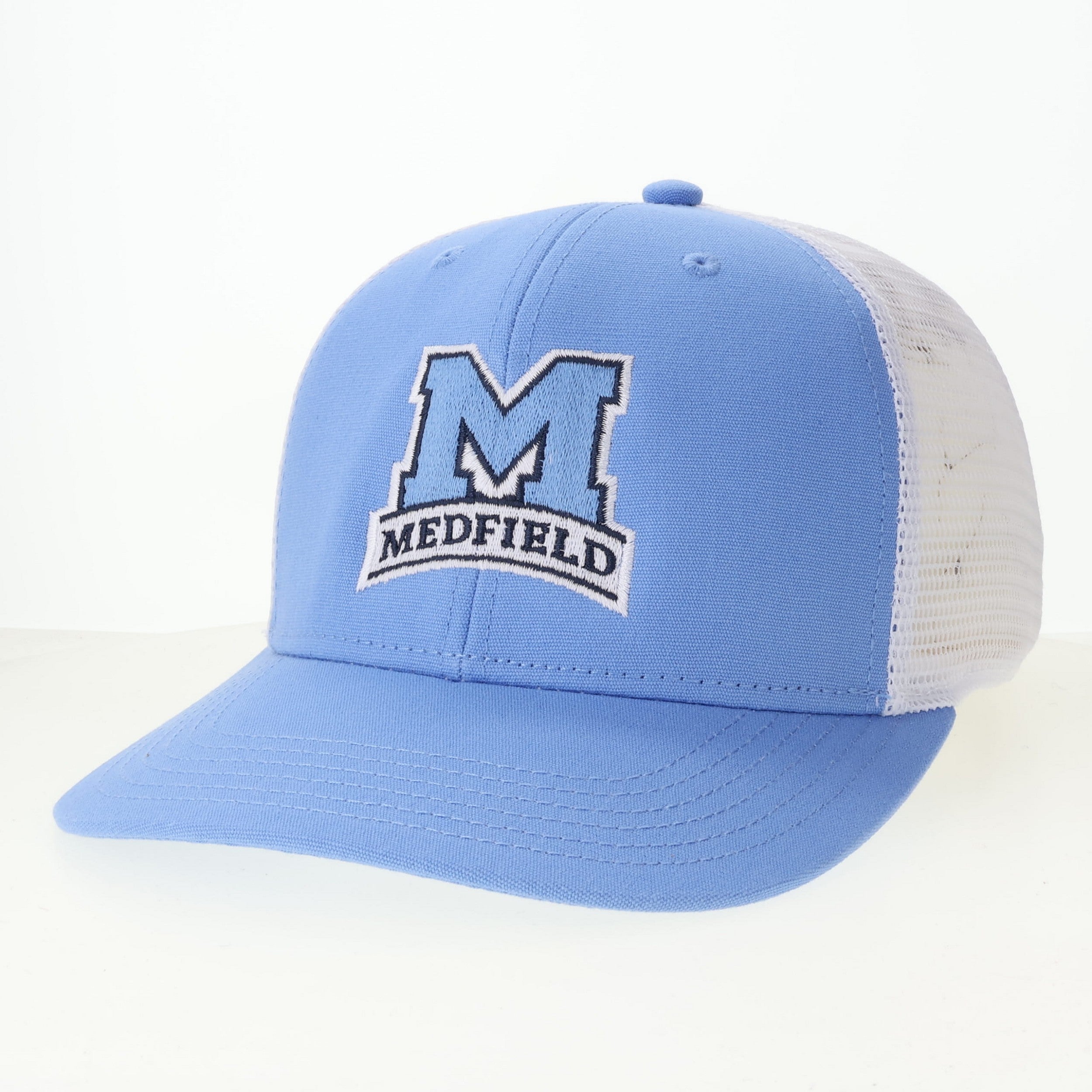 Light blue cap with white mesh back and 'Medfield' logo on a white background. Available at Be Charmed.