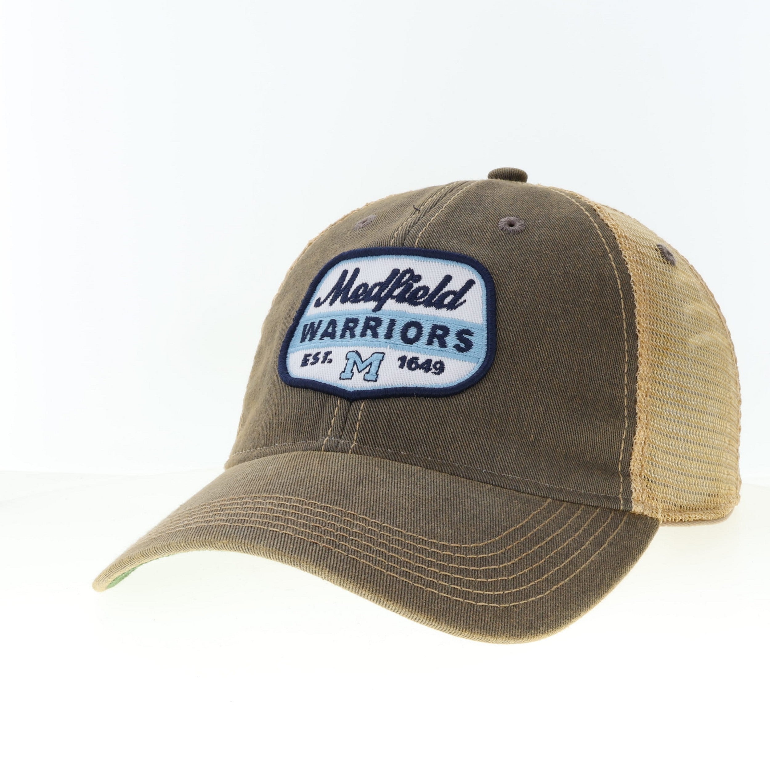 Grey trucker cap with 'Madfield Warriors' patch on a white background. Available at Be Charmed