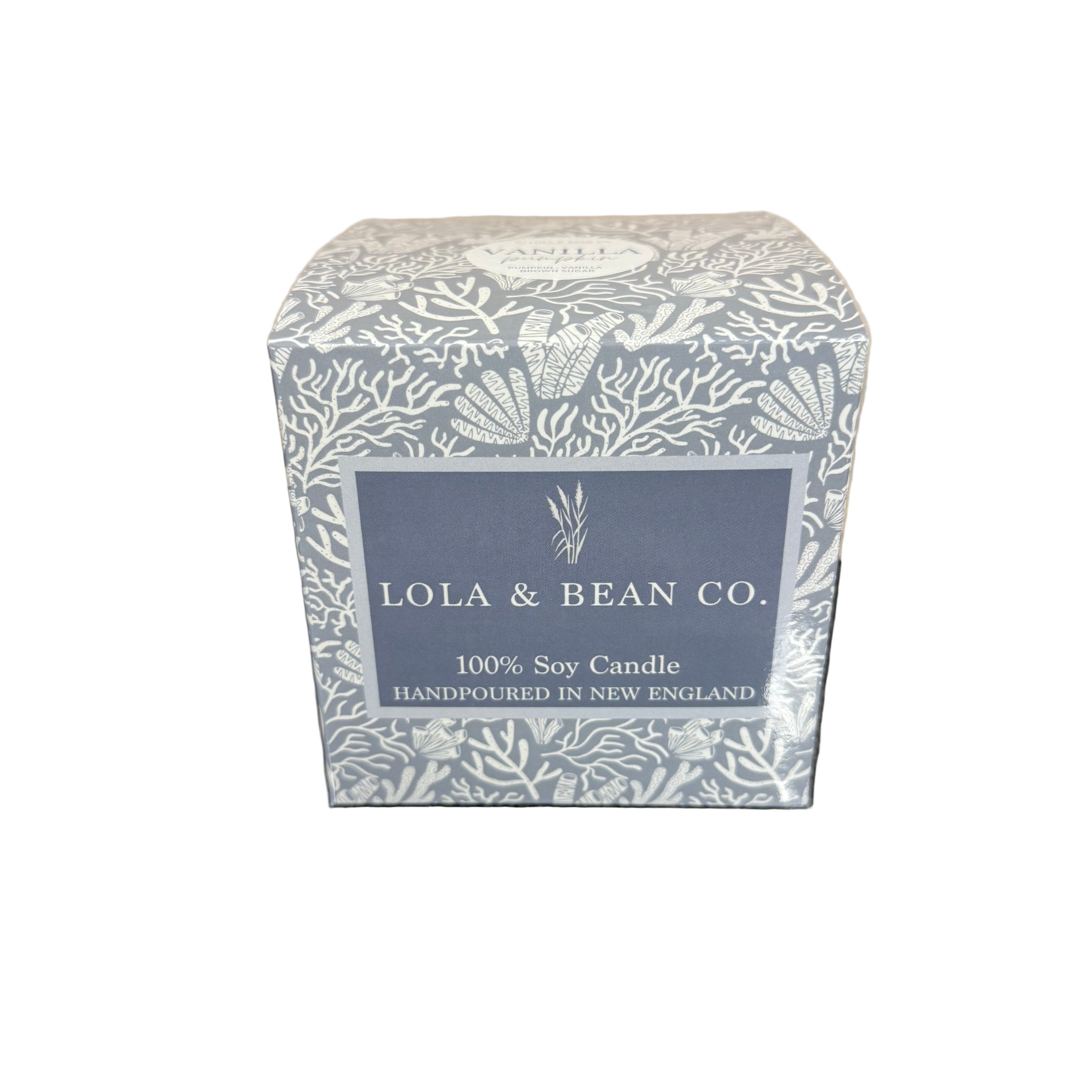 Candle packaging with 'Lola & Bean Co.' branding on a white background. Available at Be Charmed. 