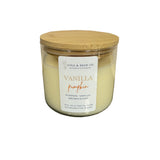 Candle jar with a wooden lid and vanilla pumpkin label on a white background. Available at Be Charmed. 