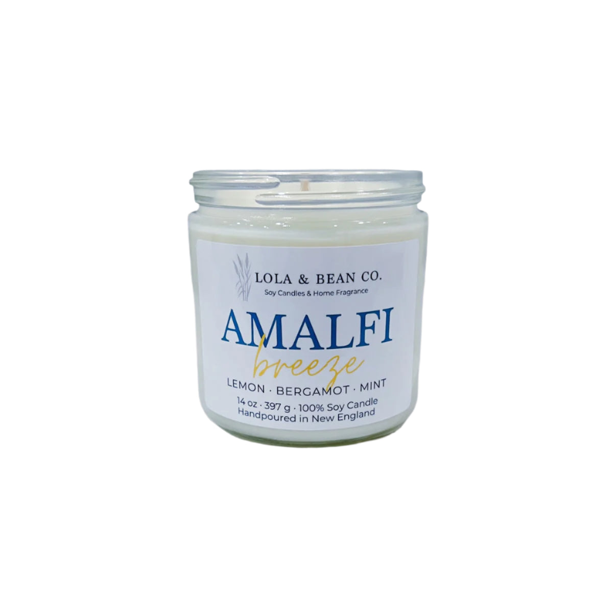 A 7.5 oz soy candle jar with a label reading 'Amalfi Breeze' and indicating the scent with lemon, bergamot, and mint. Available at Be Charmed