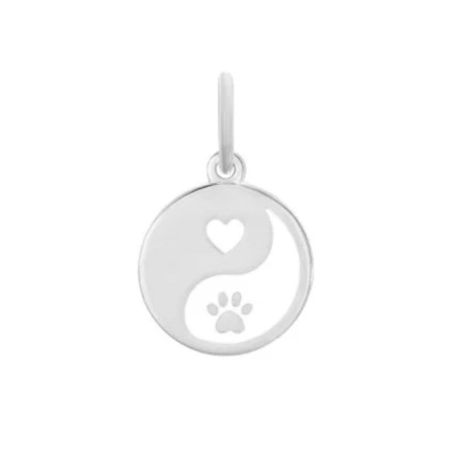 Silver alpine white pendant with yin yang design featuring a heart and paw print on a white background. Available at Be Charmed. 