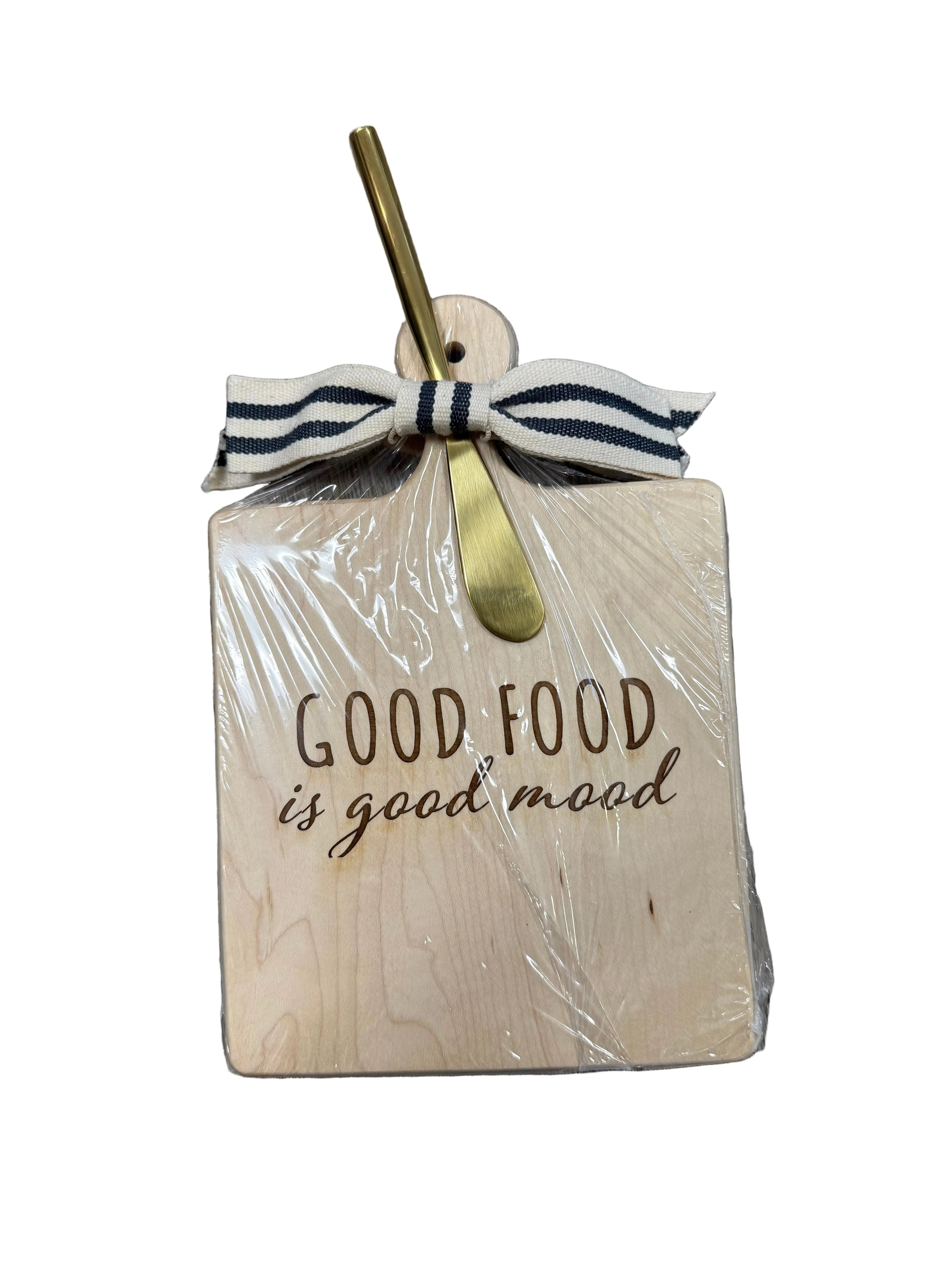 Wooden board with 'Good food is good mood' text, wrapped in cellophane with a ribbon and gold bow. Available at Be Charmed