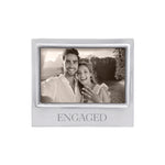 Mariposa silver photo frame with 'ENGAGED' text containing a black and white photo of a couple. This frame makes a great engagement gift, Available at Be Charmed. 