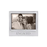 Mariposa silver photo frame with 'ENGAGED' text containing a black and white photo of a couple. This frame makes a great engagement gift, Available at Be Charmed. 