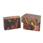Two marbled soap bars on a white background. Available at Be Charrmed