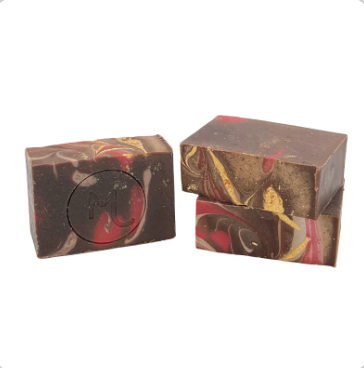 Two marbled soap bars on a white background. Available at Be Charrmed