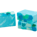 Three bars of blue and green soap with a swirled pattern on a white background> Available at Be Charmed