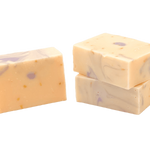 Three bars of Molly's Apothecary bar soap, Lemon Lavender, with a creamy texture and speckled with small flecks. Available at Be Charmed
