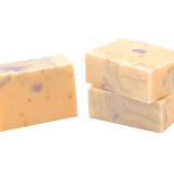 Three bars of Molly's Apothecary bar soap, Lemon Lavender, with a creamy texture and speckled with small flecks. Available at Be Charmed