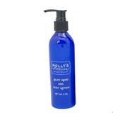Blue lotion bottle with pump labeled 'Molly's' on a white background. Available at Be Charmed