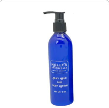 Blue lotion bottle with pump labeled 'Molly's' on a white background. Available at Be Charmed