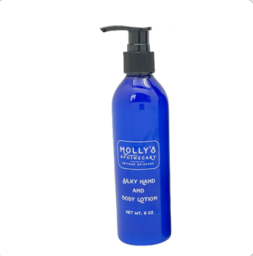 Blue lotion bottle with pump labeled 'Molly's' on a white background. Available at Be Charmed
