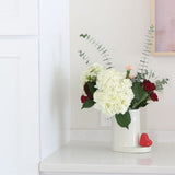 Nora Fleming Be Mine Heart Mini ceramic attachment featuring a red heart design on a dish. Available at Be Charmed.