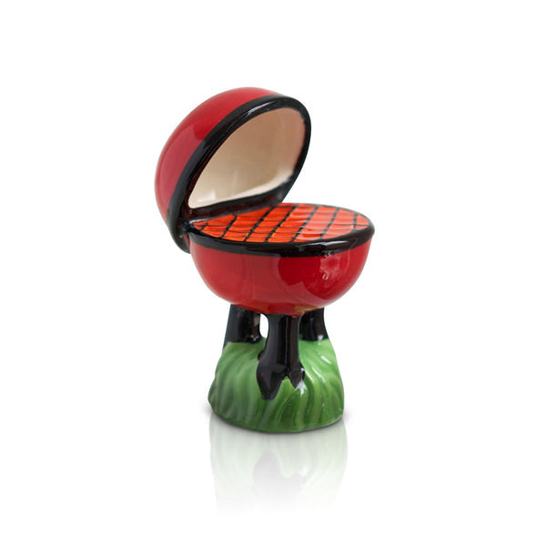 Nora Fleming Hot Stuff Mini ceramic attachment featuring a red barbecue grill design—perfect for Father’s Day and summer cookouts. Available at Be Charmed.