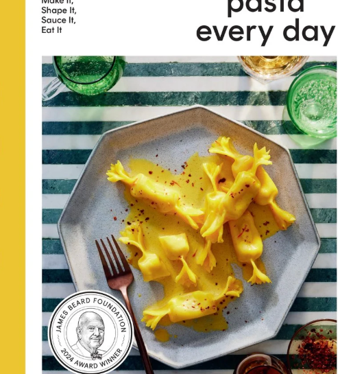 Book cover of 'Pasta Every Day' with a plate of pasta and a glass of green drink on a striped background. Available at Be Charmed