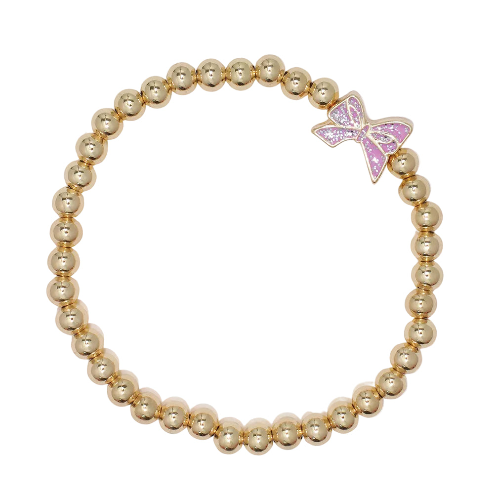 Periwinkle Little Love Gold Pink Ribbon Bracelet featuring a delicate gold chain with a pink ribbon charm, available at Be Charmed.