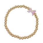 Periwinkle Little Love Gold Pink Ribbon Bracelet featuring a delicate gold chain with a pink ribbon charm, available at Be Charmed.