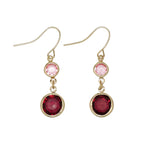 Periwinkle burgundy and pink crystal dangle earrings featuring vibrant faceted stones in a polished setting, available at Be Charmed
