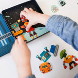 Child playing with magnetic play set