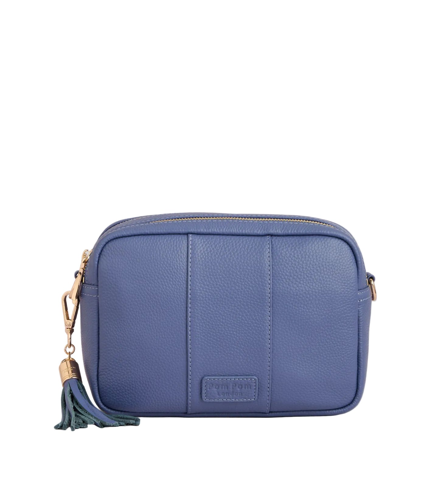 Lupin Blue Pom Pom London City Bag – handcrafted leather crossbody with interchangable straps and London-inspired design. Available at Be Charmed.
