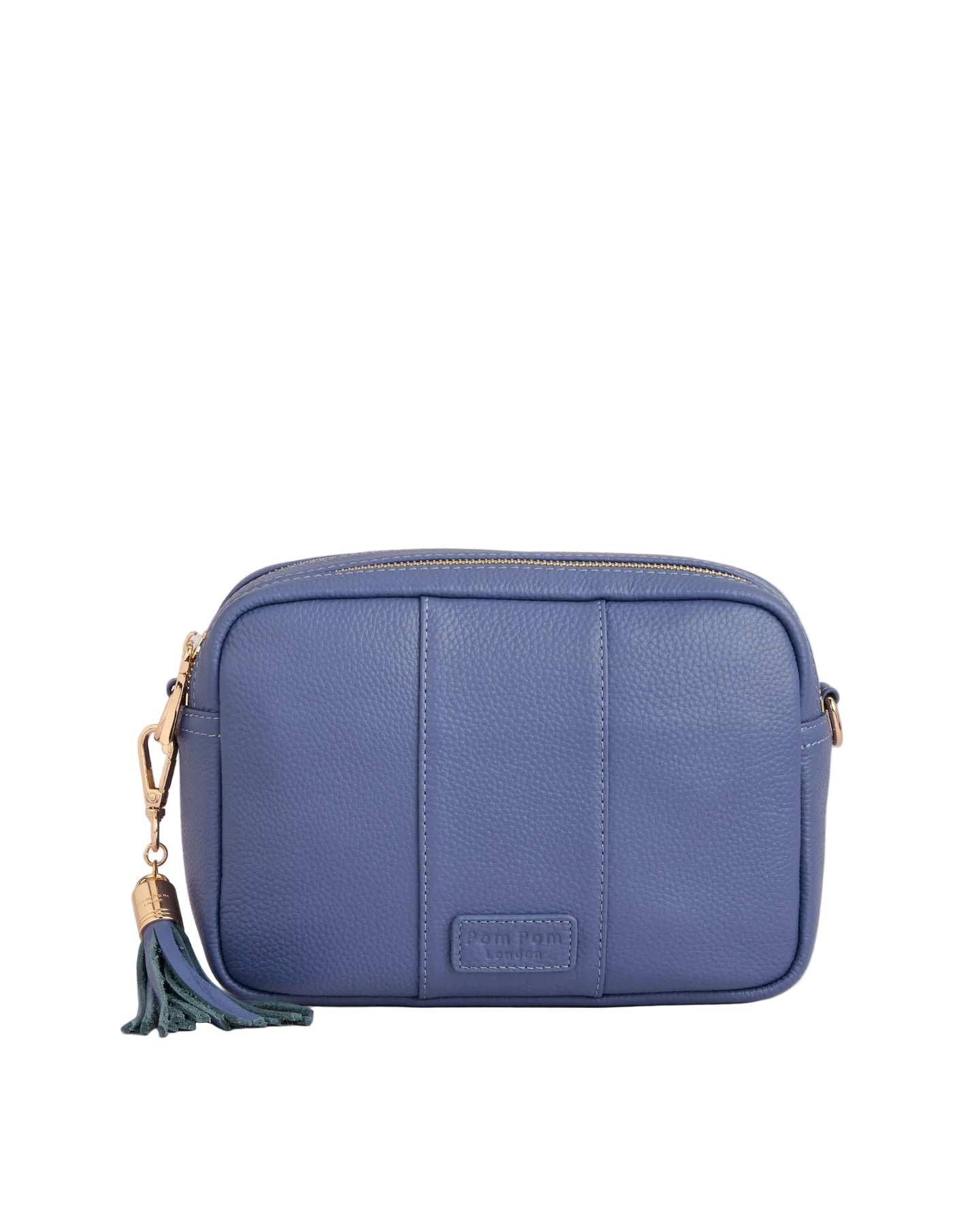 Lupin Blue Pom Pom London City Bag – handcrafted leather crossbody with interchangable straps and London-inspired design. Available at Be Charmed.