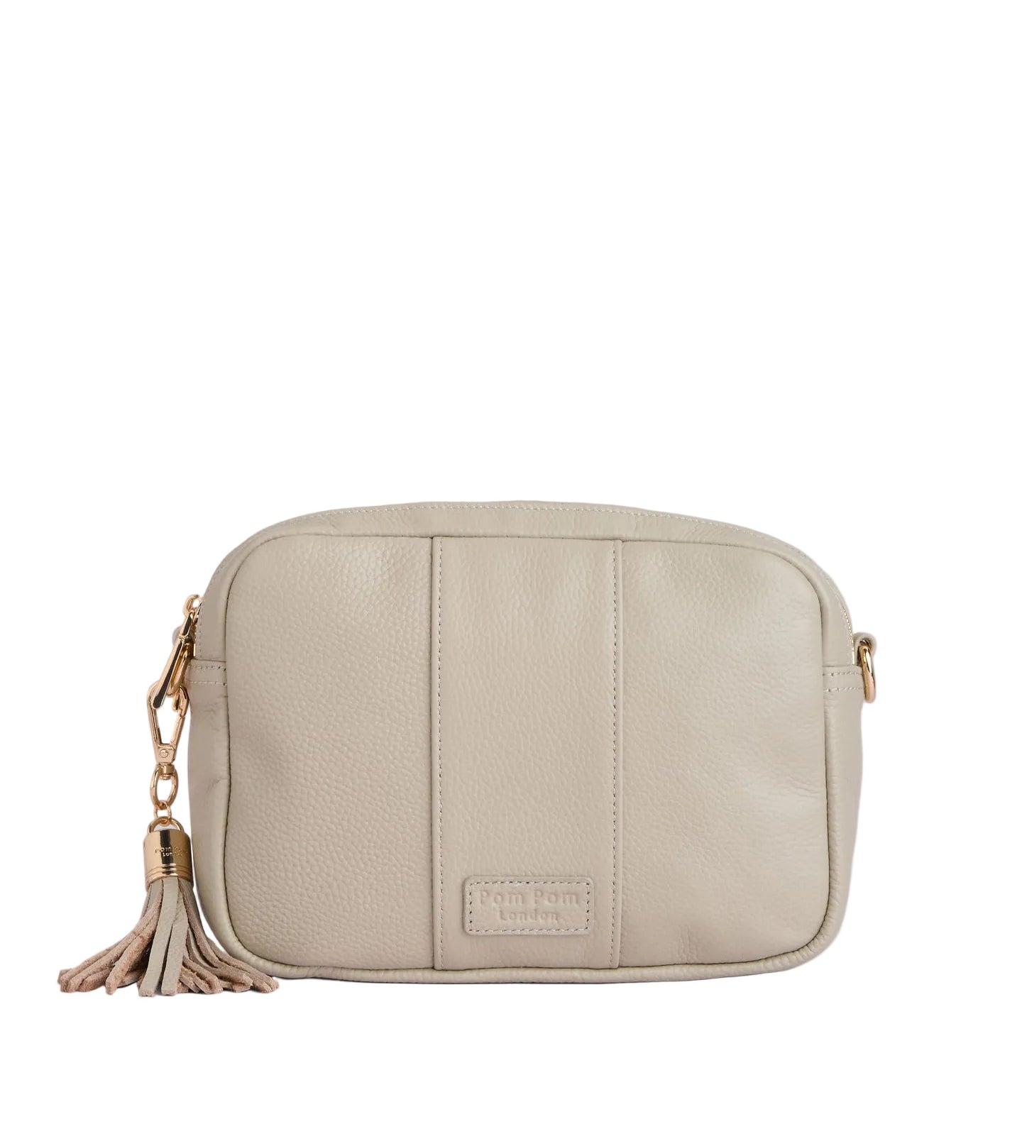 Stone Pom Pom London City Bag – handcrafted leather crossbody with interchangable straps and London-inspired design. Available at Be Charmed.