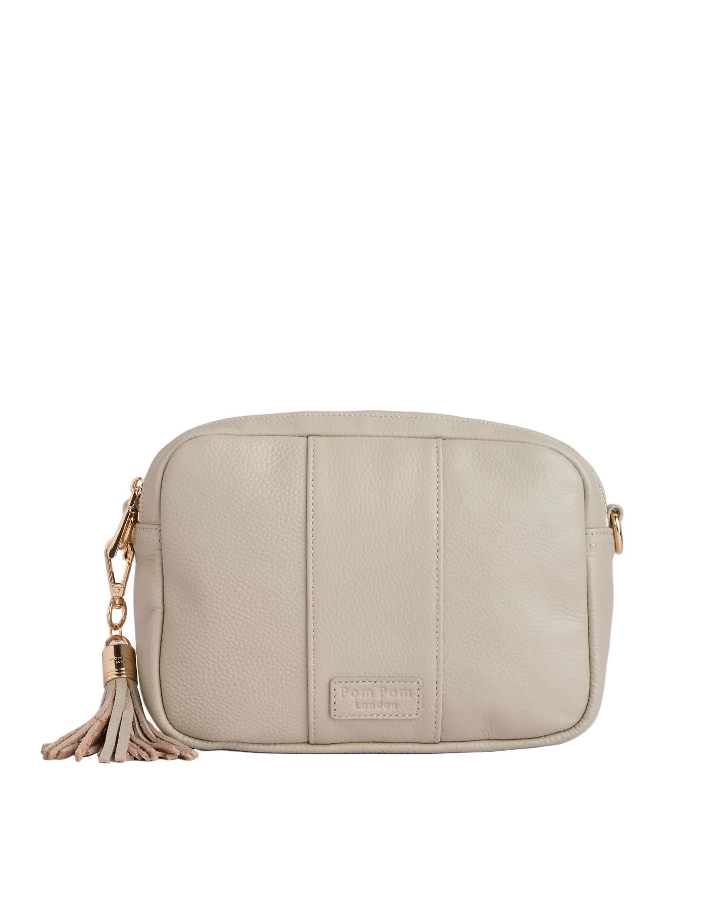 Stone Pom Pom London City Bag – handcrafted leather crossbody with interchangable straps and London-inspired design. Available at Be Charmed.