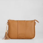 Maple Pom Pom London City Slim Bag – handcrafted leather crossbody with sleek design and adjustable strap. Designed in London. Available at Be Charmed.