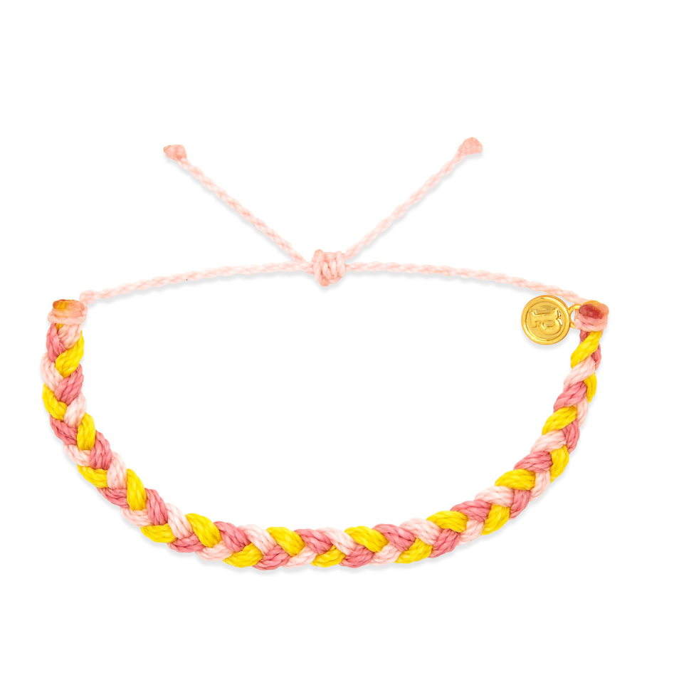 Blushing Lemonade Pura Vida braided bracelet available at Be Charmed.