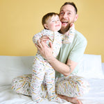 Picture of Dad and Baby wearing Magnetic Me Reel Good Time Modal Convertible Coverall