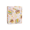 A medium gift bag with a whimsical pattern of cupcakes, cake slices, and stars on a white background, shown on a clean white studio background. Available at Be Charmed