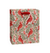 A Rifle Paper Co gift bag with a repeating pattern of red cardinals, green leaves, and small red flowers on a cream background, featuring red paper handles.  Available at Be Charmed