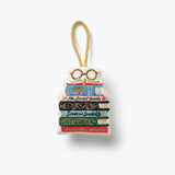 DecorativeRifle Parper Co  ornament shaped like a bookshelf with books and glasses on a white background. Available at Be Charmed