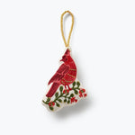 Rifle Paper Co. embroidered ornament featuring a detailed red cardinal perched among festive foliage, available at Be Charmed