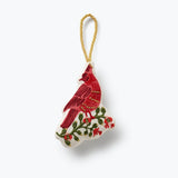 Rifle Paper Co. embroidered ornament featuring a detailed red cardinal perched among festive foliage, available at Be Charmed