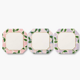 Three octagonal paper notepads with floral borders, arranged horizontally on a light gray background. Available at Be Charmed