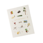 A cream-colored greeting card with a 'HAPPY RETIREMENT!' message surrounded by small, whimsical illustrations of travel and leisure items, shown on a clean white background. Available at Be Charmed
